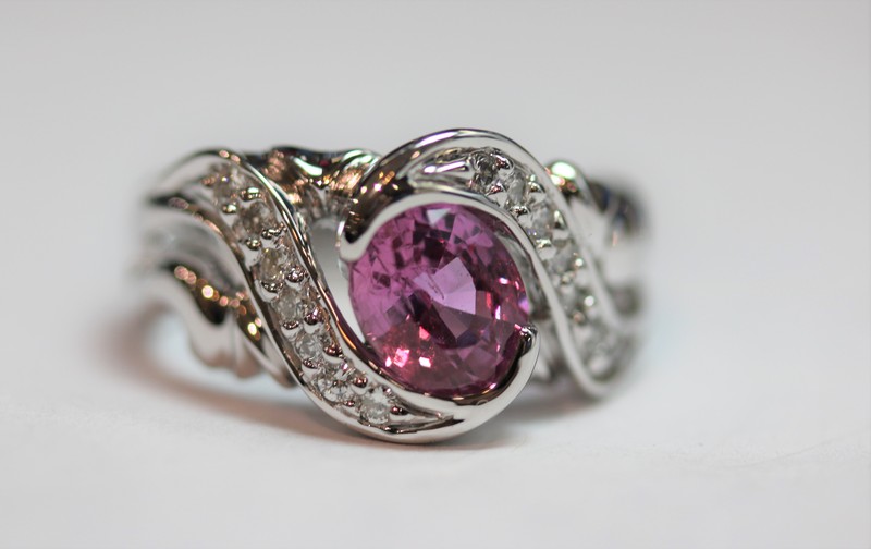 custom jewelry  designed ring with diamonds and pink sapphire